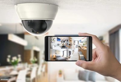 پروژه ها 5 hand holding 3d rendering mobile connect with security camera